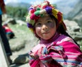 Portrait of a Peruvian girl dressed in colorful traditional handmade outfit Royalty Free Stock Photo