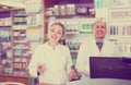 Portrait of pharmacists working in farmacy