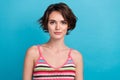 Portrait photo of cute joyful nice good mood girl smile young lady wear striped knitted singlet summer isolated on blue