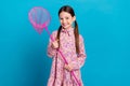 Portrait photo of satisfied young girl brunette hair hold butterfly net catch small animals playful kid isolated on blue Royalty Free Stock Photo