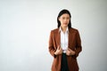 Portrait photo of young beautiful Asian woman feeling happy and holding smart phone, tablet and laptop with black empty screen on Royalty Free Stock Photo