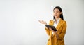 Portrait photo of young beautiful Asian woman feeling happy and holding smart phone, tablet and laptop with black empty screen on Royalty Free Stock Photo