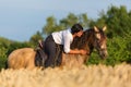 Portrait of a woman on an Andalusian horse Royalty Free Stock Photo