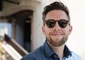 Portrait picture of young handsome man with glasses smiling Royalty Free Stock Photo