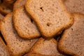 A portrait of a pile of multiple tasty delicious crispy rusk, sea biscuit or hardtack biscuits, ideal food for a lunch, brunch or