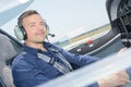 Portrait pilot in cockpit airoplane