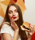 Playful girl posing with burger Royalty Free Stock Photo