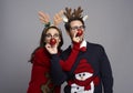 Playful couple in Christmas time