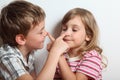 Portrait of playful little girl and boy