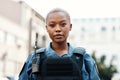 Portrait, police or black woman in city for law enforcement, community protection or legal street safety. Cop