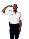 Portrait of police officer saluting Royalty Free Stock Photo