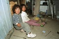 Portrait Poor Argentinian girls playing in slum dwelling