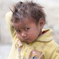 Portrait poor young boy in India