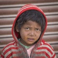 Portrait poor young boy in India