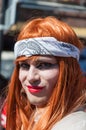Portrait of a posing redheaded drag queen