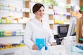 Pharmacist ready to assist in choosing at counter