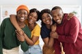 Portrait of positive african american couples, home interior