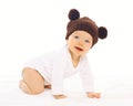 Portrait positive baby in knitted brown hat