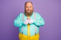 Portrait of positive cheerful fat man use smartphone texting typing reading social media news wear teal shirt yellow Royalty Free Stock Photo