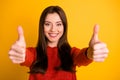 POrtrait of positive cheerful lady show double thumb up give her feedback about excellent sales discounts wear red