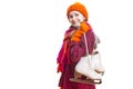 Portrait of Positive Laughing Caucasian Girl in Winter Clothes Posing with Ice Skates In Both Hands Against Pure White Background Royalty Free Stock Photo