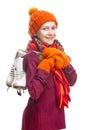 Portrait of Positive Laughing Caucasian Girl in Winter Clothes Posing with Ice Skates In Both Hands Against Pure White Background Royalty Free Stock Photo