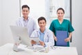Portrait of positive medical professionals on office and looking at camera Royalty Free Stock Photo