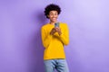 Portrait of positive nice young man hold use smart phone chatting texting isolated on purple color background Royalty Free Stock Photo