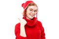 Portrait positive redhead young woman in red christmas sweater smiling pointing finger at empty copy space for text or product Royalty Free Stock Photo