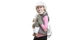 Portrait of Positive Smiling Caucasian Blond Girl in Winter Clothes. Posing Half-Turned with Ice Skates Over Shoulder In Hands In Royalty Free Stock Photo