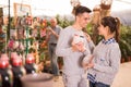 Portrait of positive young couple at the garden store Royalty Free Stock Photo