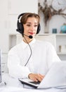 Portrait of positive young woman call center worker Royalty Free Stock Photo