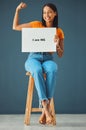 Portrait, poster and black woman with strong arm pose in studio for body positivity, acceptance or self love on grey Royalty Free Stock Photo