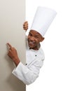 Portrait, poster and hand pointing by black man chef in studio for checklist, menu or space on white background. Bakery