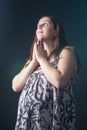 Portrait of Praying Pregnant Caucasian Female. Royalty Free Stock Photo