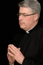 Portrait of praying priest Royalty Free Stock Photo