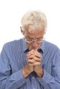 Portrait praying senior man