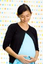 Portrait of pregnant asian ethnic woman