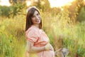 Portrait pregnant Happy smiling Woman sitting and caressing her b