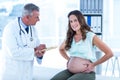 Portrait of pregnant woman with male doctor Royalty Free Stock Photo
