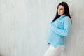 Portrait of a pregnant woman preparing to come baby Royalty Free Stock Photo