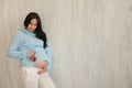 Portrait of a pregnant woman preparing to come baby Royalty Free Stock Photo
