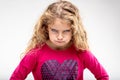 Preteen sulky girl making angry face Royalty Free Stock Photo