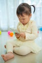 Portrait of pretty asian little girl talking on phone Royalty Free Stock Photo