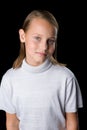 Portrait of pretty blonde preteen girl. Photo session in the studio Royalty Free Stock Photo