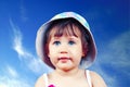 Portrait of pretty blue-eyed girl in a hat Royalty Free Stock Photo