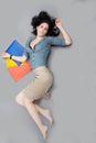 Businesswoman lying on the floor