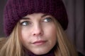 Portrait of pretty caucasian young girl in the city park in cold winter day Royalty Free Stock Photo