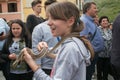 Portrait of pretty child with snake at the feast of Saint Dominic in the Cocullo medieval village, Abruzzo