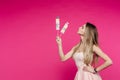 Funny girl like doll with marshmallow candy on stick. Royalty Free Stock Photo